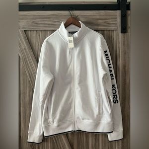 MK. Men’s light jacket. With tag attached, never worn.